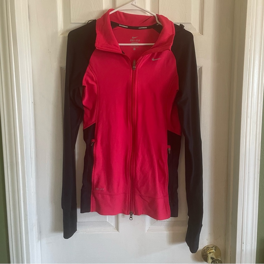 Nike Dri-FIT running jacket in a pink and black color combination hooded size S